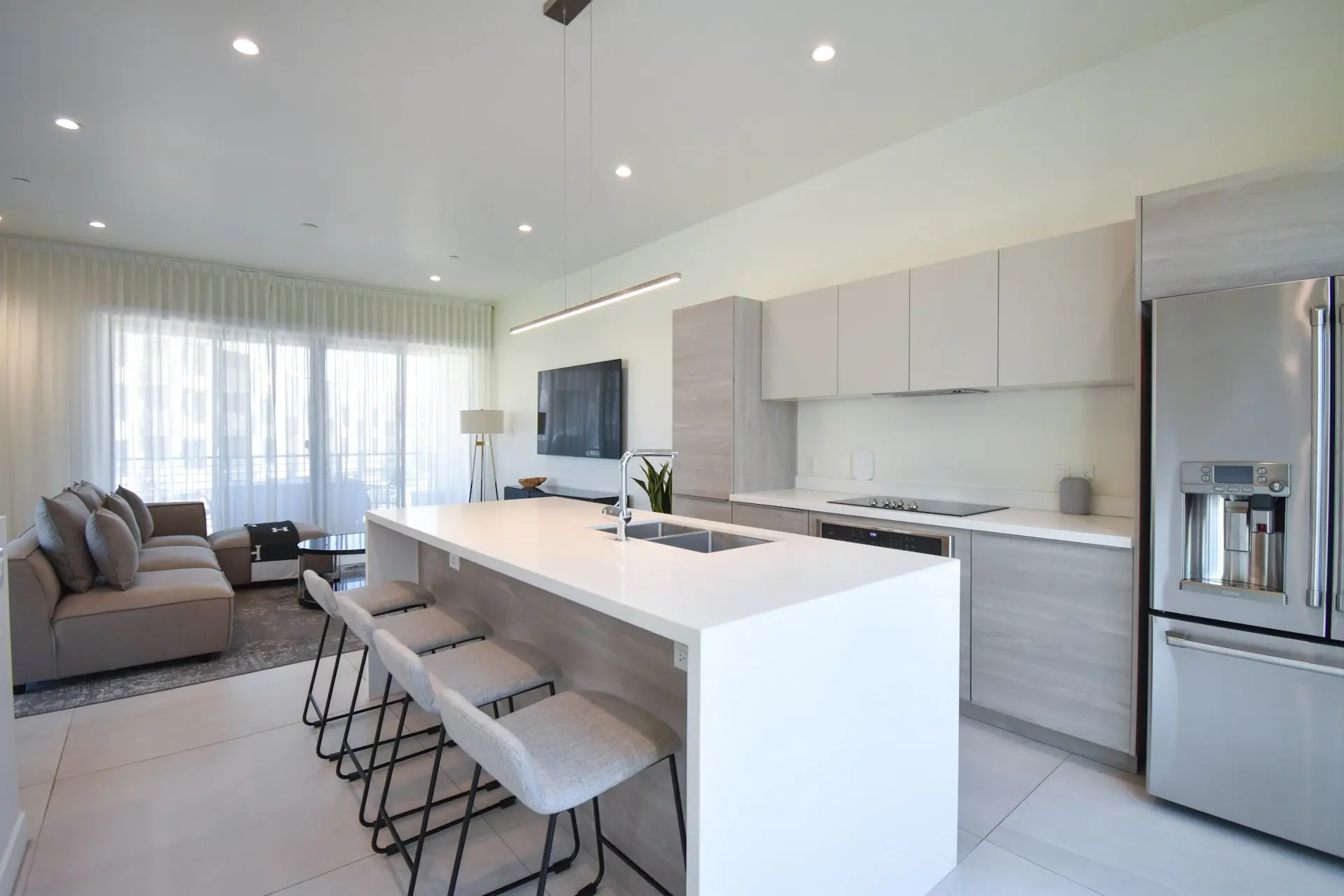 a kitchen with a refrigerator freezer sitting next to a counter